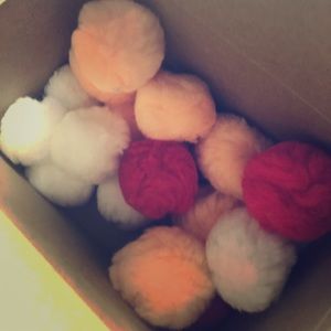 A box of pompoms for decoration for your house :)